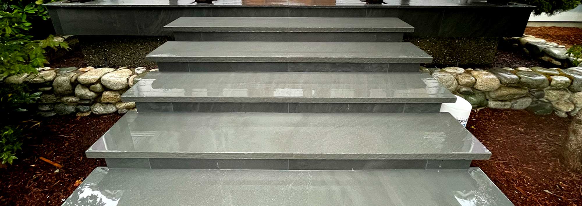 stone steps at the front of a home